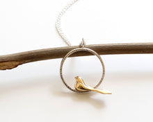 Load image into Gallery viewer, Handcrafted Bronze Bird Necklace with Textured Sterling Silver Circle Pendant
